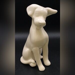 Ceramic sitting white dog figurine